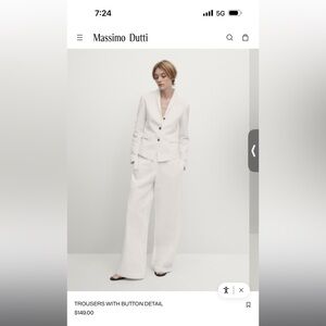 Stunning Massimo Dutto white linen trousers with snap bottom detail